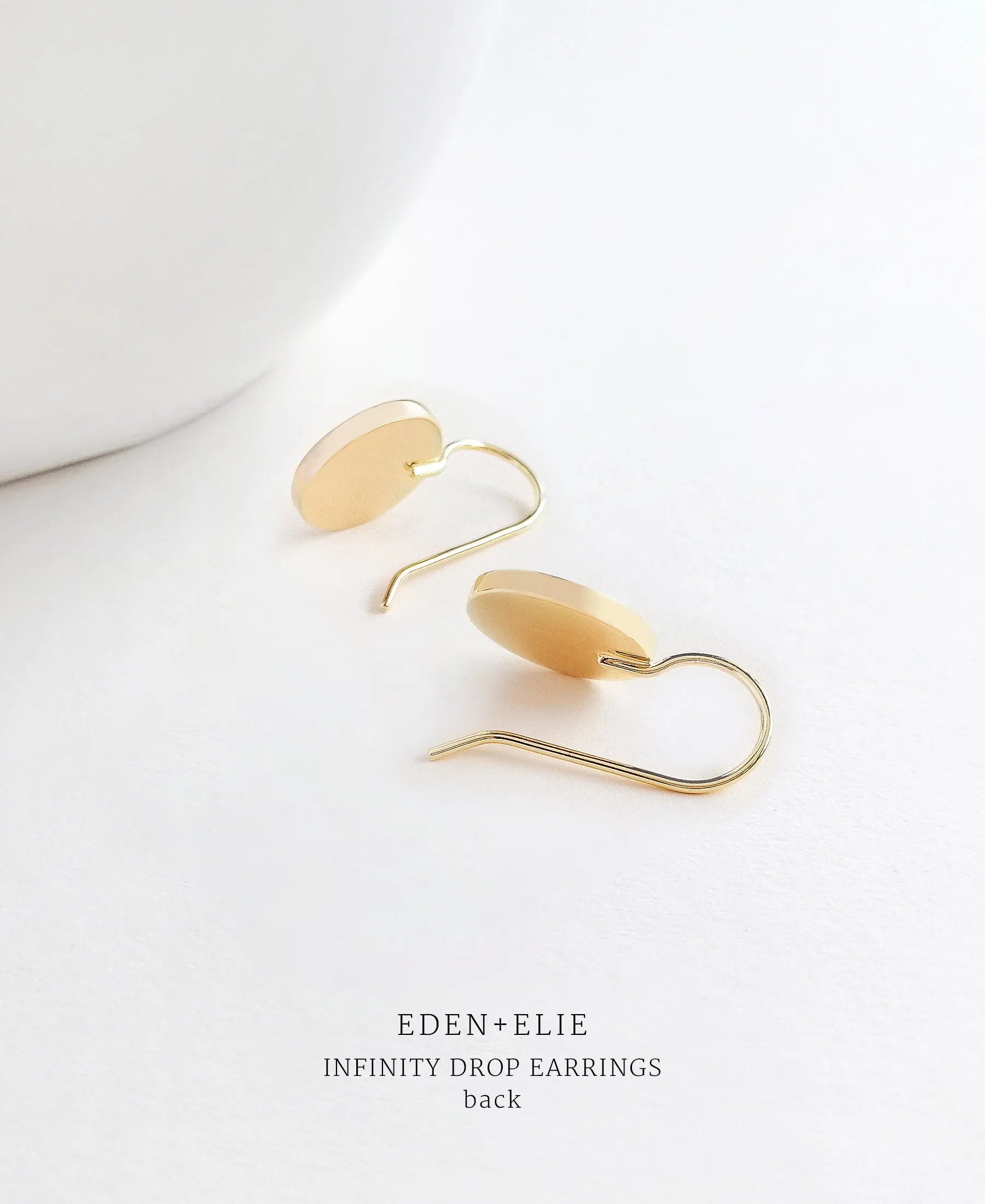 EDEN   ELIE Infinity drop earrings - pollen